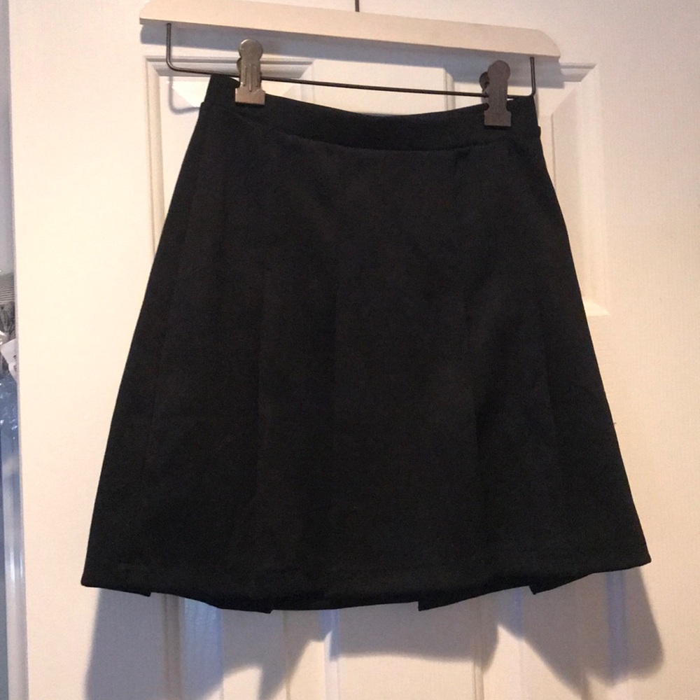 Girls black pleated pull on skirt